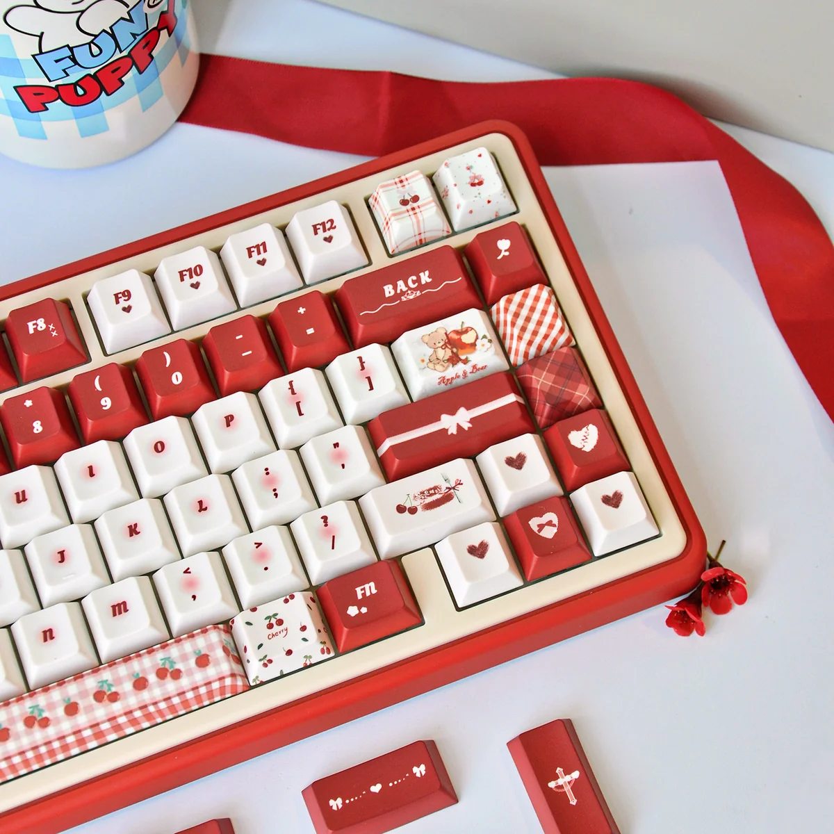 Vibrant PBT Dye-Sub Cherry Profile keycaps set from the Cherry Day set, showcased from various angles with cheerful red and white cherry legends.