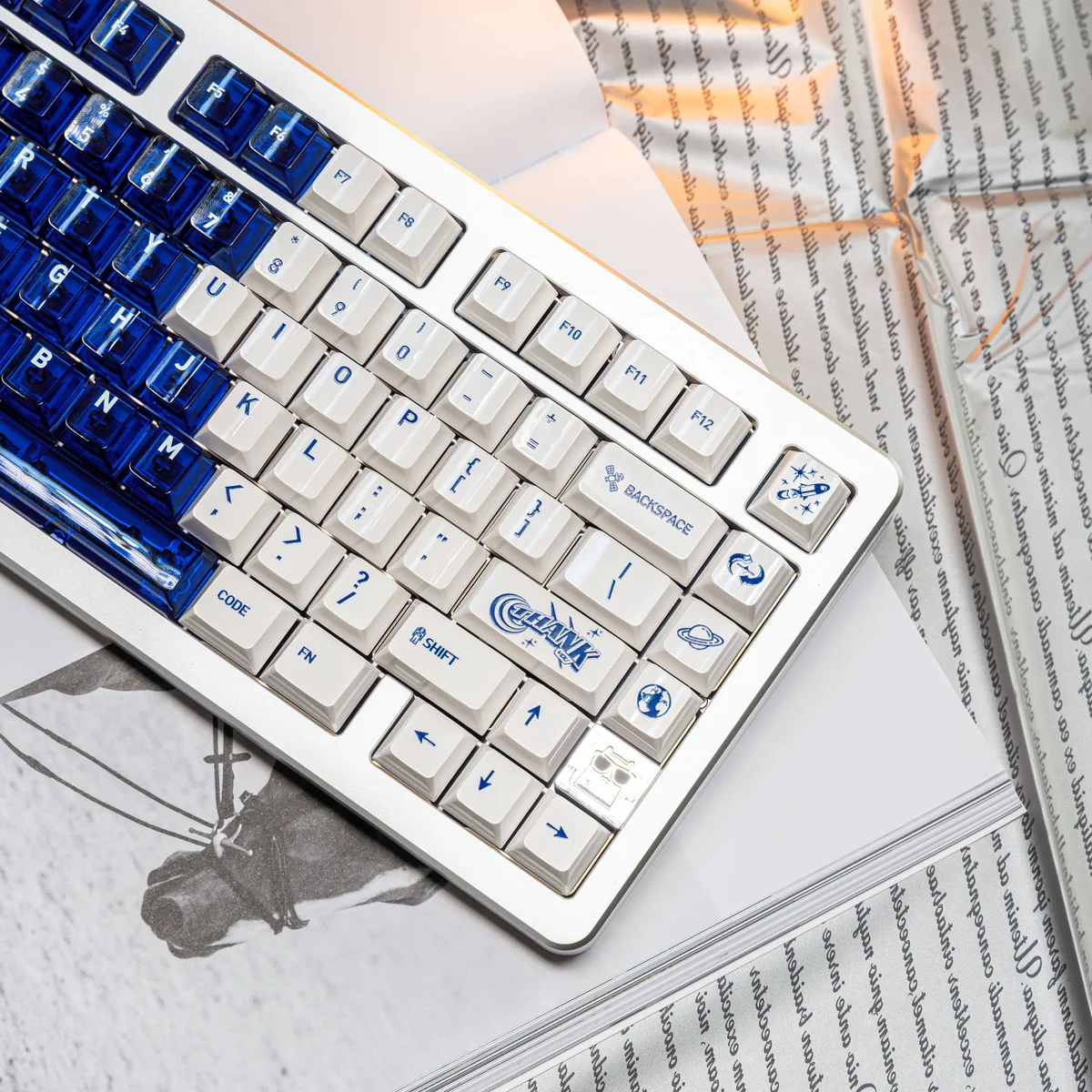 Close-up of Luminous Acid Blue White PC keycaps set, showcasing their striking translucent blue and opaque white contrast from a unique angle.