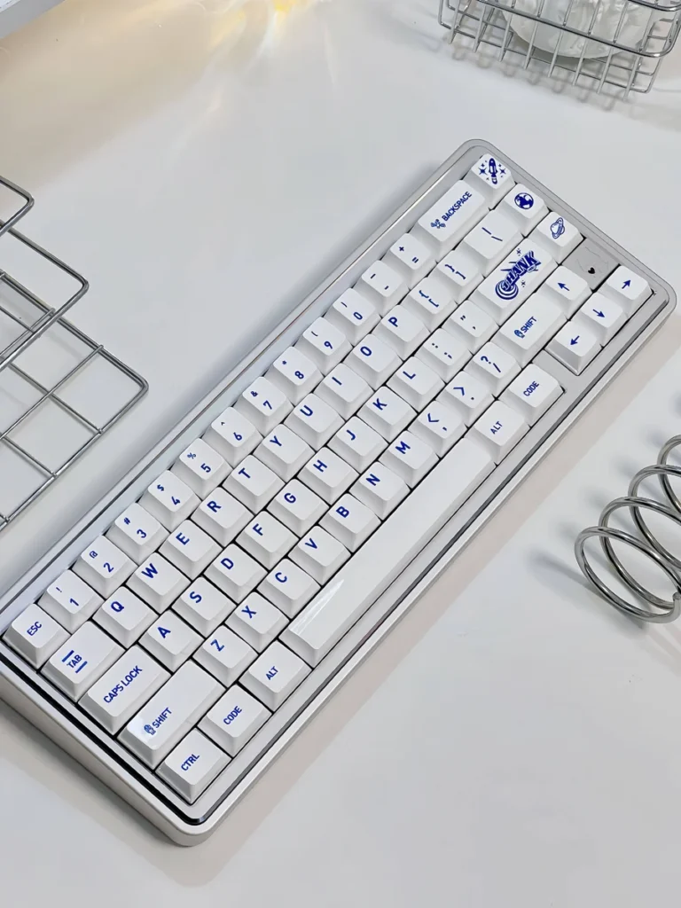 Luminous Acid Blue White PC keycaps set in a close-up, showcasing their striking translucent blue and clean opaque white contrast, illuminating a modern design.