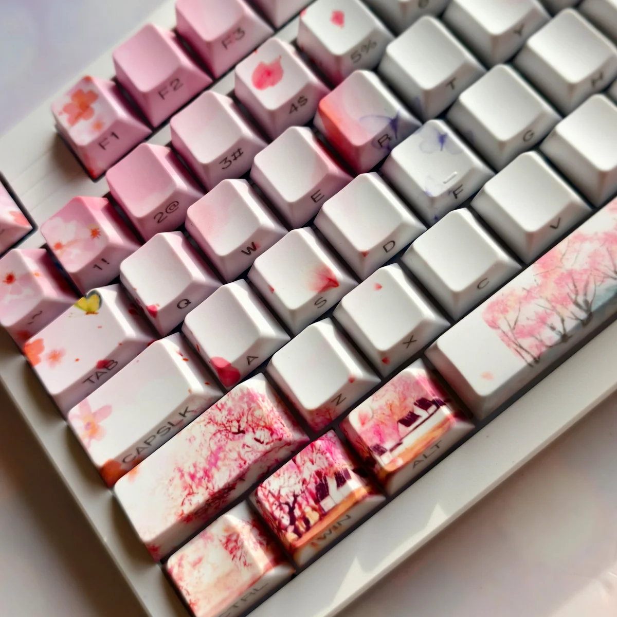 Exquisite Peach Blossom Spring PBT keycaps set, shown from various angles. Features delicate peach blossoms and idyllic ancient Chinese utopia landscape.