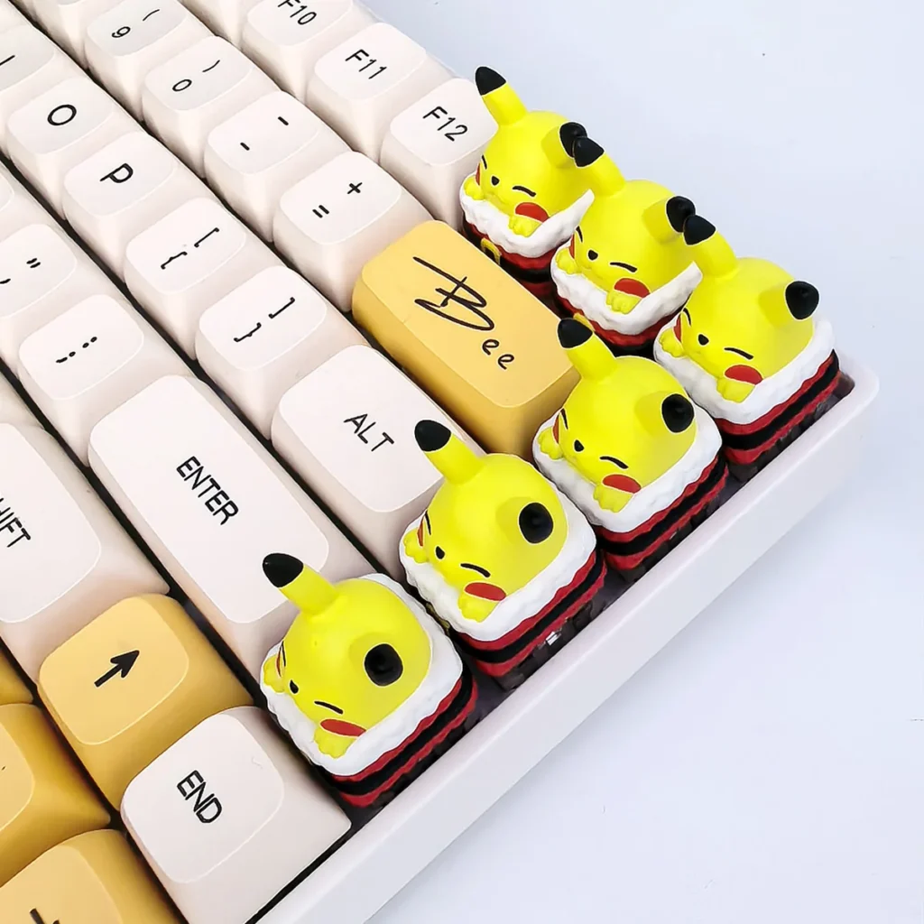 Multiple angles of a vibrant, festive handcrafted 3D resin Pikachu keycap, showcasing its intricate sculpting and playful charm on a keyboard.