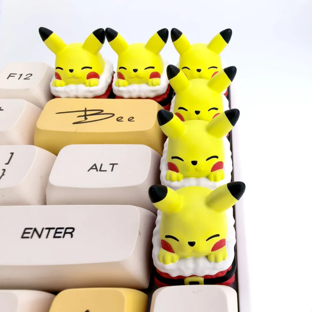 Vibrant handcrafted 3D resin Pikachu keycap, sculpted with festive details, bringing playful charm to any mechanical keyboard.