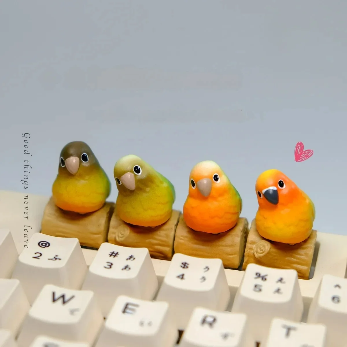 Joyful handmade Pineapple Conure Keycaps, displaying a vibrant miniature tropical scene on a rustic wood base.