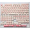 Whimsical PBT Dye-Sub Pink Cat Keycaps set, photographed from multiple playful angles, highlighting the durable finish and charming animal illustration.