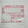 Adorable Pixel Cat PBT Keycaps MOA Set gallery. Vibrant retro pixel art cat designs, durable PBT, and unique MOA profile from various angles.