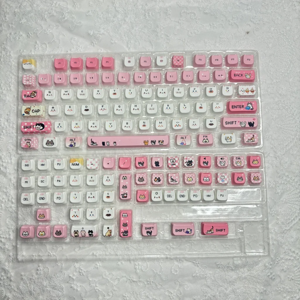 Adorable Pixel Cat PBT Keycaps MOA Set gallery. Vibrant retro pixel art cat designs, durable PBT, and unique MOA profile from various angles.