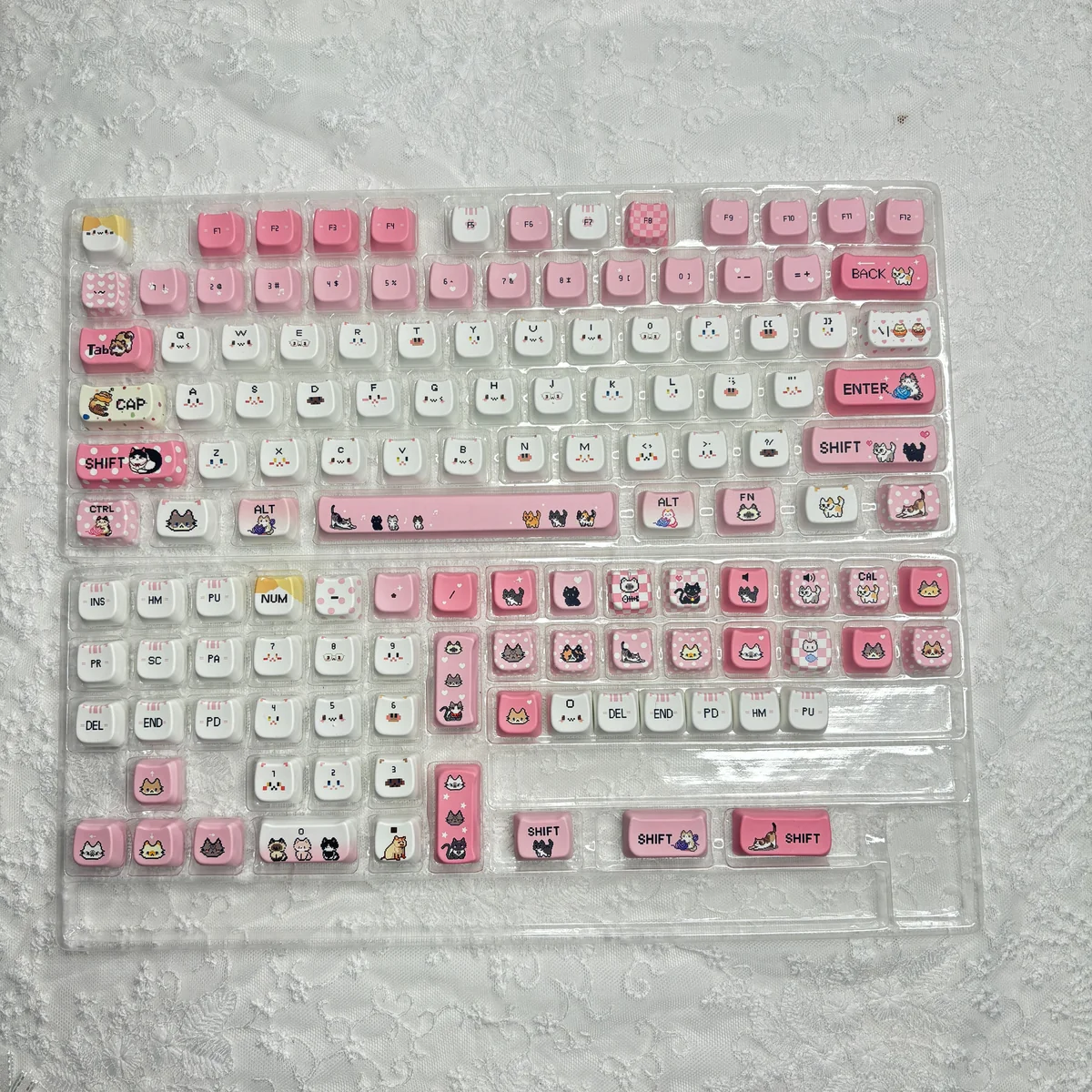 Adorable Pixel Cat PBT Keycaps MOA Set gallery. Vibrant retro pixel art cat designs, durable PBT, and unique MOA profile from various angles.