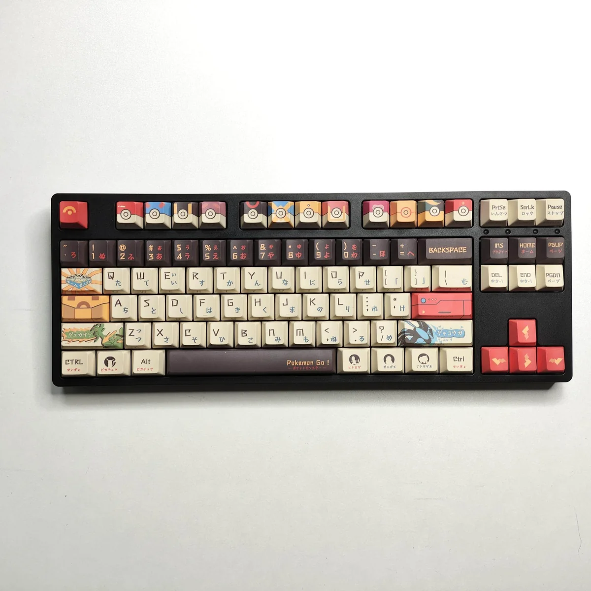 Explore a gallery of durable PBT Pokemon side-legend keycaps set, featuring iconic characters and clean, minimalist designs from multiple perspectives.