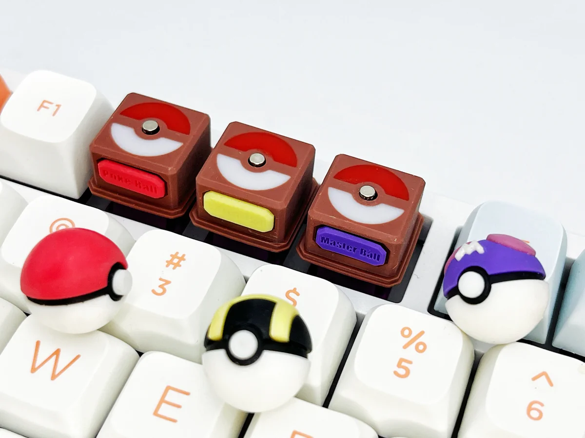 Relive childhood with this vibrant 3D Pokemon Poke Ball keycap, showcasing its iconic sculpted design from various angles, a premium collectible.