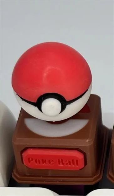 Vibrant 3D Pokemon PokeBall keycaps from various angles. Iconic sculpted designs for a playful, premium feel.