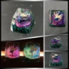 Exquisite handcrafted legendary Pokemon artisan keycap. Dynamic side view reveals intricate sculpture, vibrant colors, and translucent resin details.