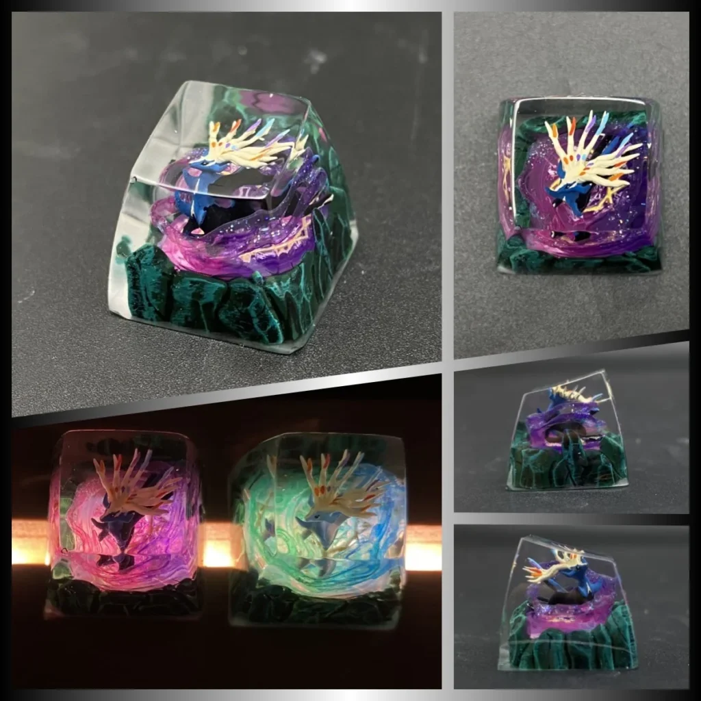 Exquisite handcrafted legendary Pokemon artisan keycap. Dynamic side view reveals intricate sculpture, vibrant colors, and translucent resin details.