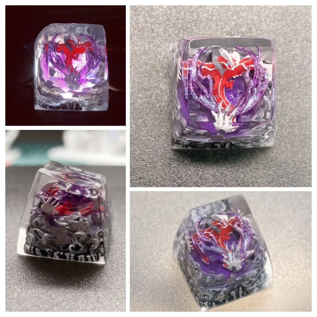 Gallery views of a handcrafted legendary Pokemon resin keycap, showcasing intricate mythical character details within translucent, vibrant resin.