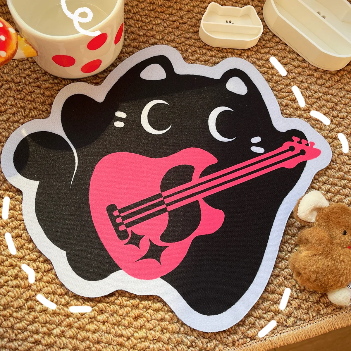 Rebellious Charm Punk Kitty Mouse Pad shown from various angles, highlighting its adorable black and pink design, unique irregular shape, and playful design.