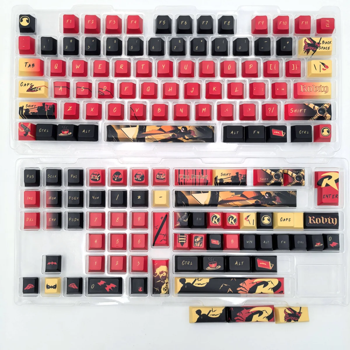 Detailed view of premium Red Robin Vigilante keycap set, showcasing striking red and black, iconic DC motifs. An exclusive heroic comic aesthetic.