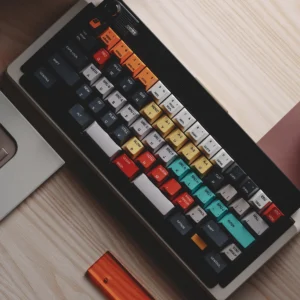 Retro Accom Keycaps Set showcase durable PBT, crisp dye-sub legends, and iconic retro design with a classic beige/grey base, vibrant accents, and vintage design.