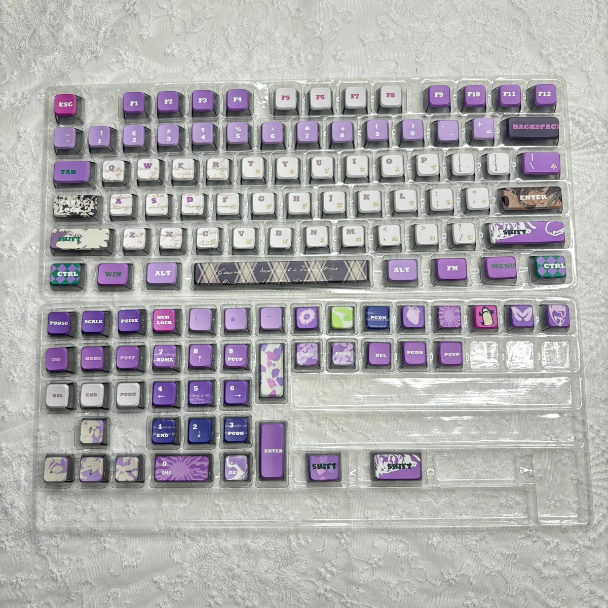 Multiple angles of Reze Chainsaw Man RGB MDA translucent PBT keycaps set, showcasing vibrant character art and explosive four-sided RGB glow.