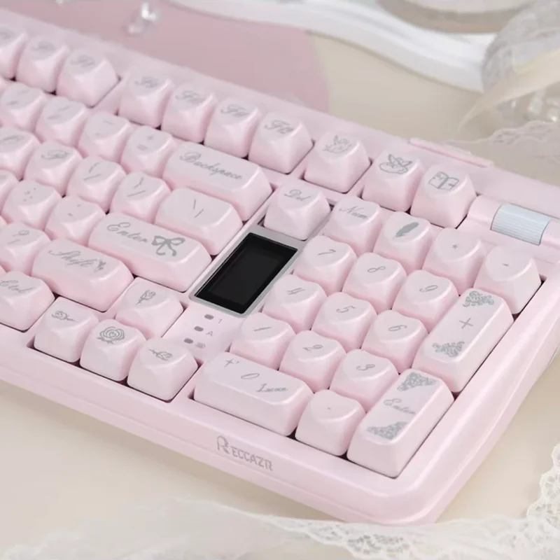 Exquisite Rococo Angel PBT keycap set, showcasing its ornate design and shimmering pastel pearlescent finish from multiple artistic angles.