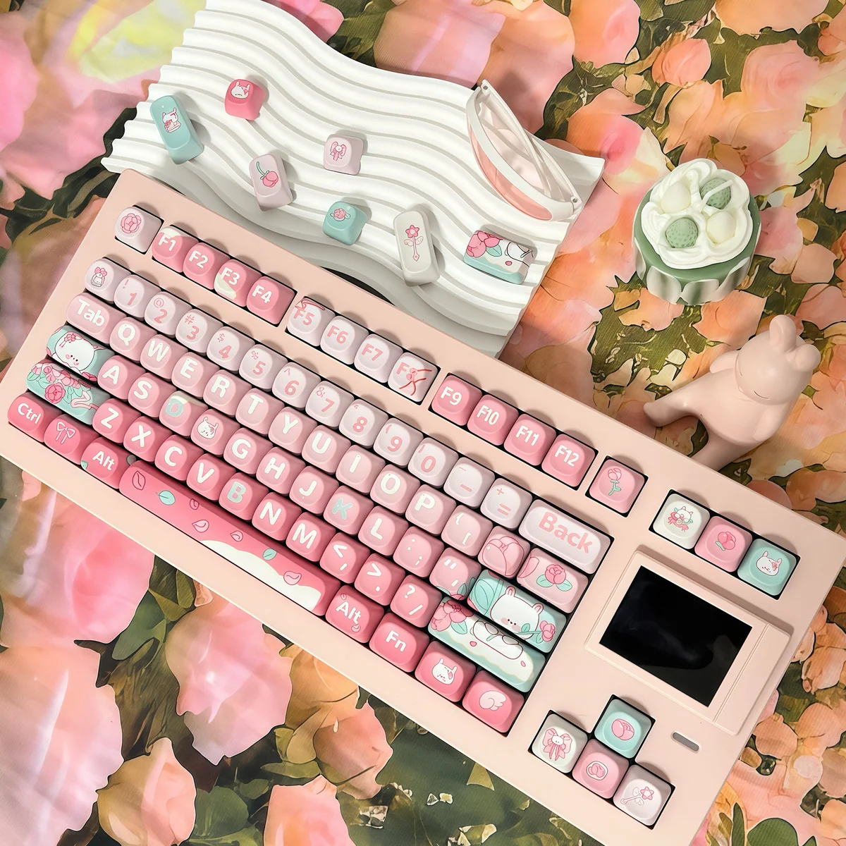 Charming Pink Rose Bunny PBT Keycaps Set from the Garden Set are playfully displayed at multiple angles, highlighting the whimsical rabbit and rose motifs.