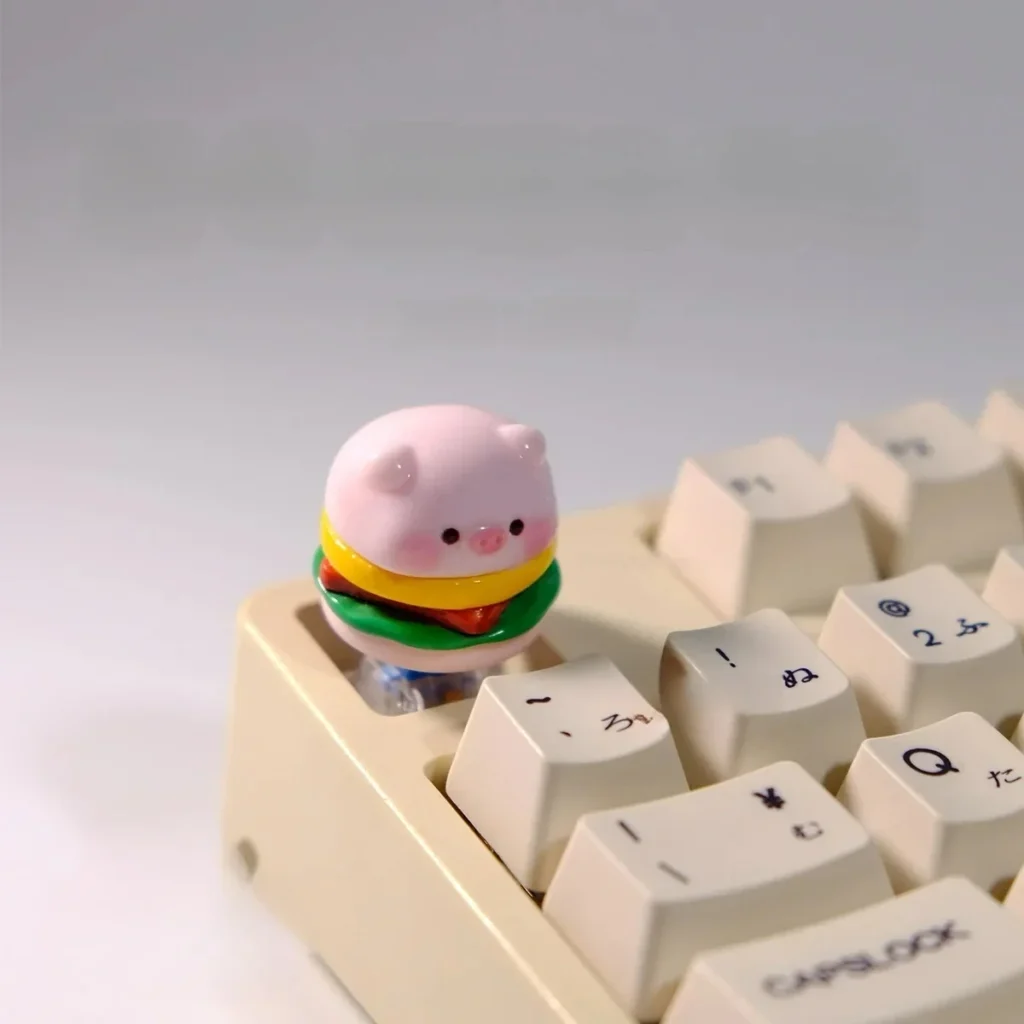 Adorable handcrafted chubby pig Sandwich keycap for MX switches, featuring vibrant colors and a unique 3D sculpted design.