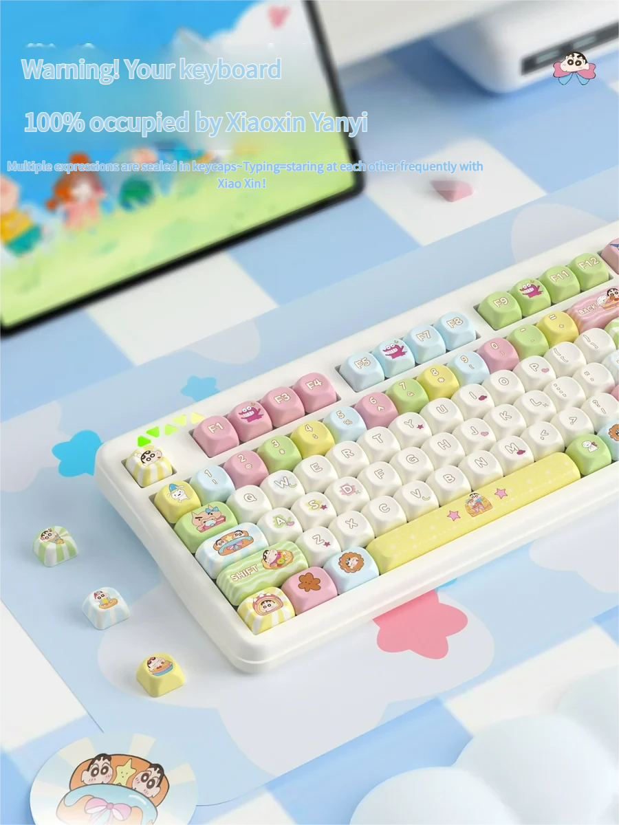 Close-up of a vibrant Shin-chan PBT dye-sub keycap set, showcasing mischievous Crayon Shin-chan characters and crisp, durable legends from a playful angles.
