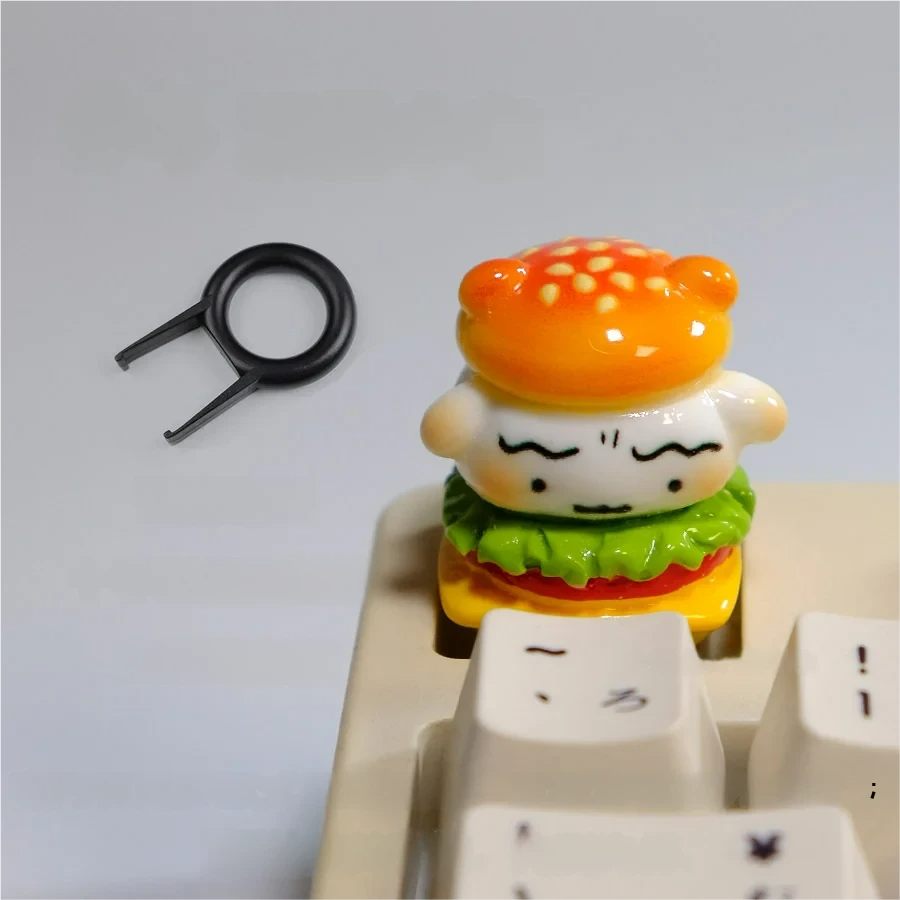 Handcrafted playful Shiro artisan keycap, with whimsical Crayon Shin-chan and a delightful hamburger design, meticulously sculpted from resin.