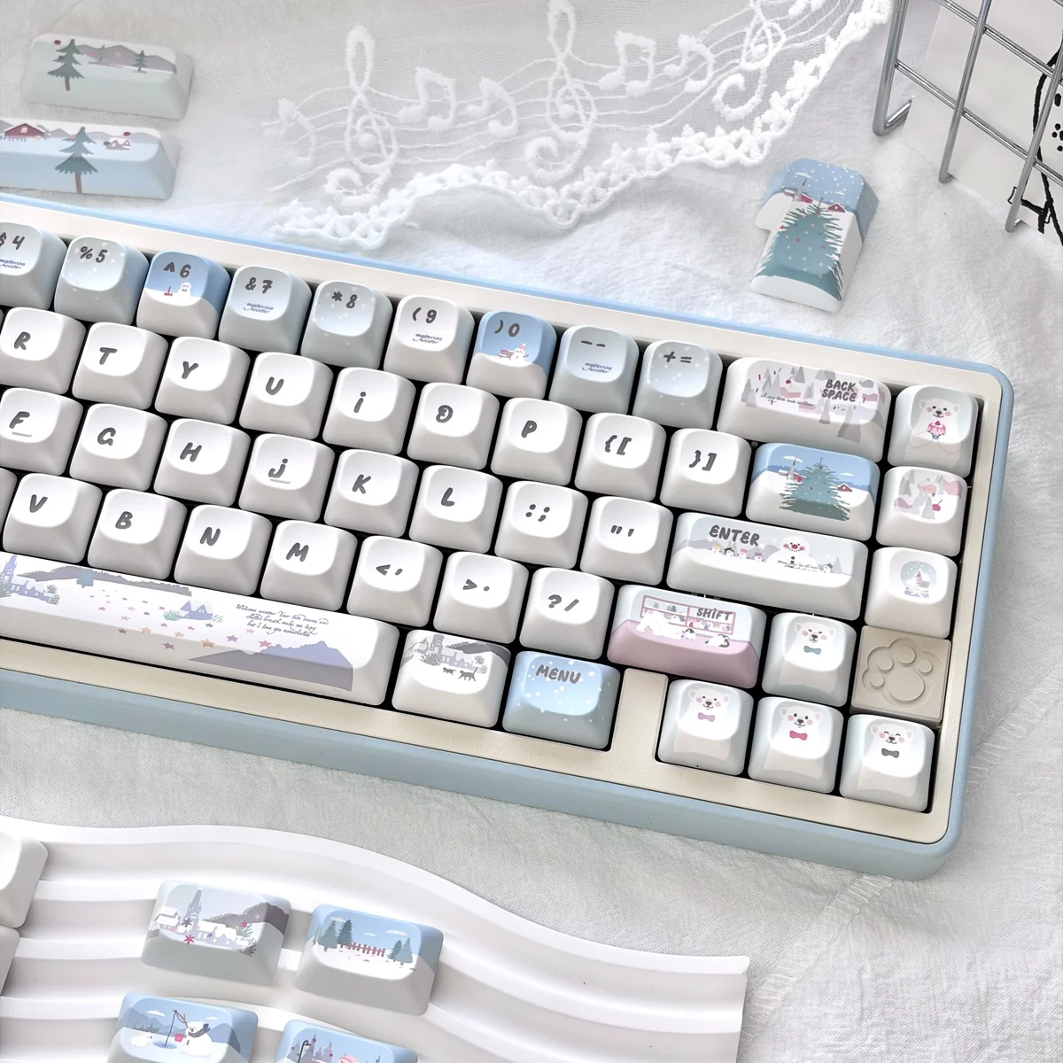 Whimsical snowman mechanical keycaps from various angles, showing playful blue and white winter wonderland with charming snowmen and snowflakes.
