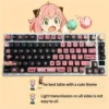 Explore various angles of these vibrant Spy x Family PBT dye-sub keycaps set, featuring detailed anime characters and a playful four-sided backlit glow.