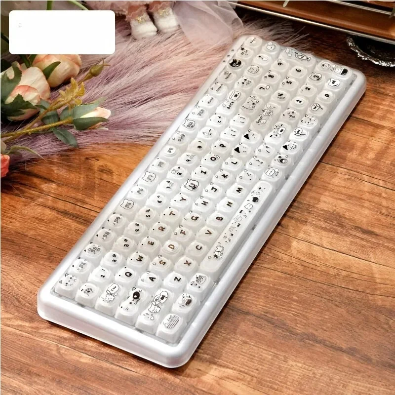 Explore the Stylish X100Pro Tri-Mode Membrane Keyboard from various angles, highlighting its pastel cat-inspired design, soft RGB glow, and silent tri-mode functionality.