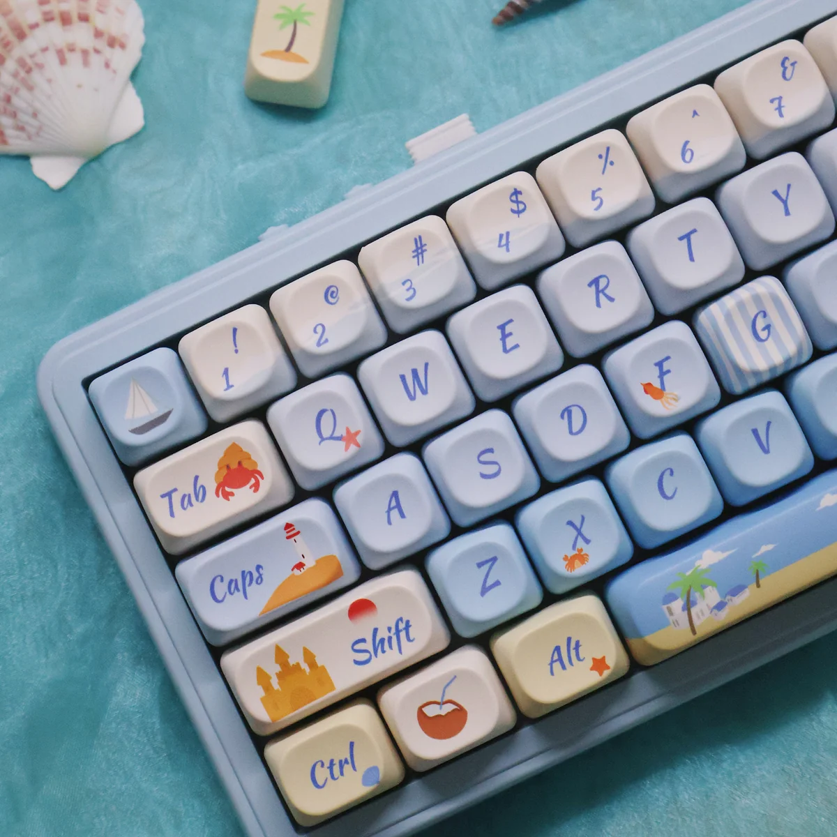 MOA profile opaque PBT dye-sub keycaps set capturing a vibrant summer beach, with azure waters and playful motifs for a serene keyboard escape.