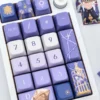 Artisan Sunday Impressionist MDA profile keycaps set, captured from multiple angles. Handcrafted painterly landscapes with soft hues evoke classic masterpieces.