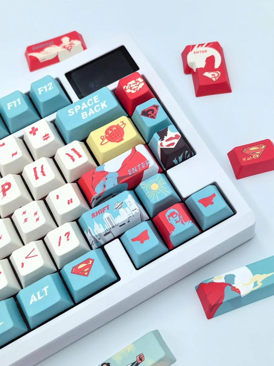 Exclusive DC Superman keycaps full set, showcased from multiple angles highlighting the iconic red and blue design and heroic emblem for a premium collectible setup.