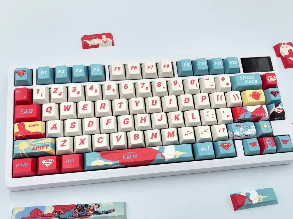 Heroic full set DC Superman keycaps set main display, showcasing iconic red and blue design with the classic emblem. Exclusive collector's item.