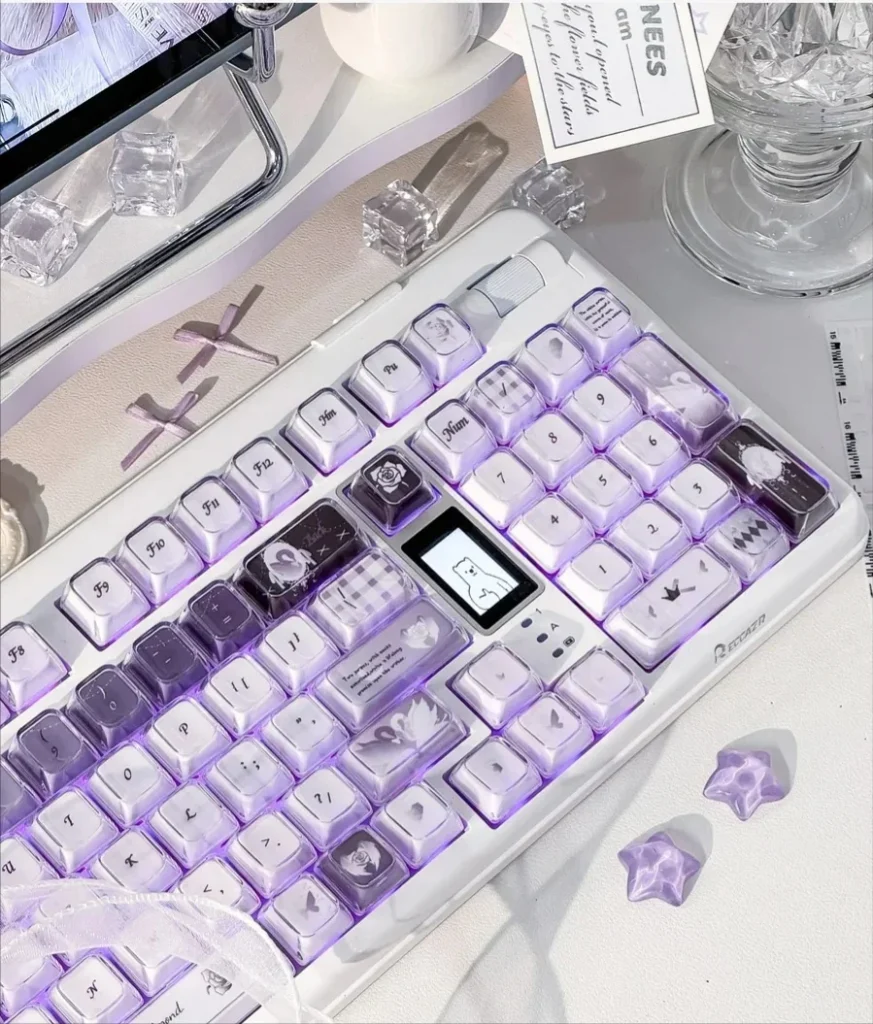 Handcrafted Ethereal Swan Realm Keycap Set showcasing its translucent amber and deep purple double layers, an artistic and unique design.