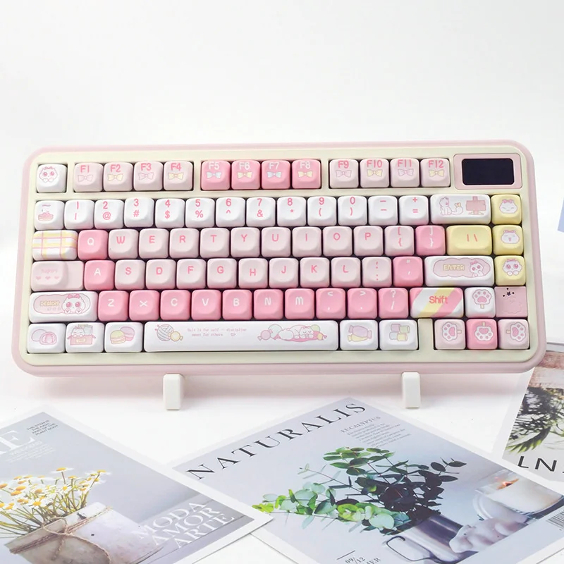 A gallery of Sweet cat PBT MOA profile keycaps set in pastel colors, showcasing whimsical feline designs from various angles, highlighting their durable material.