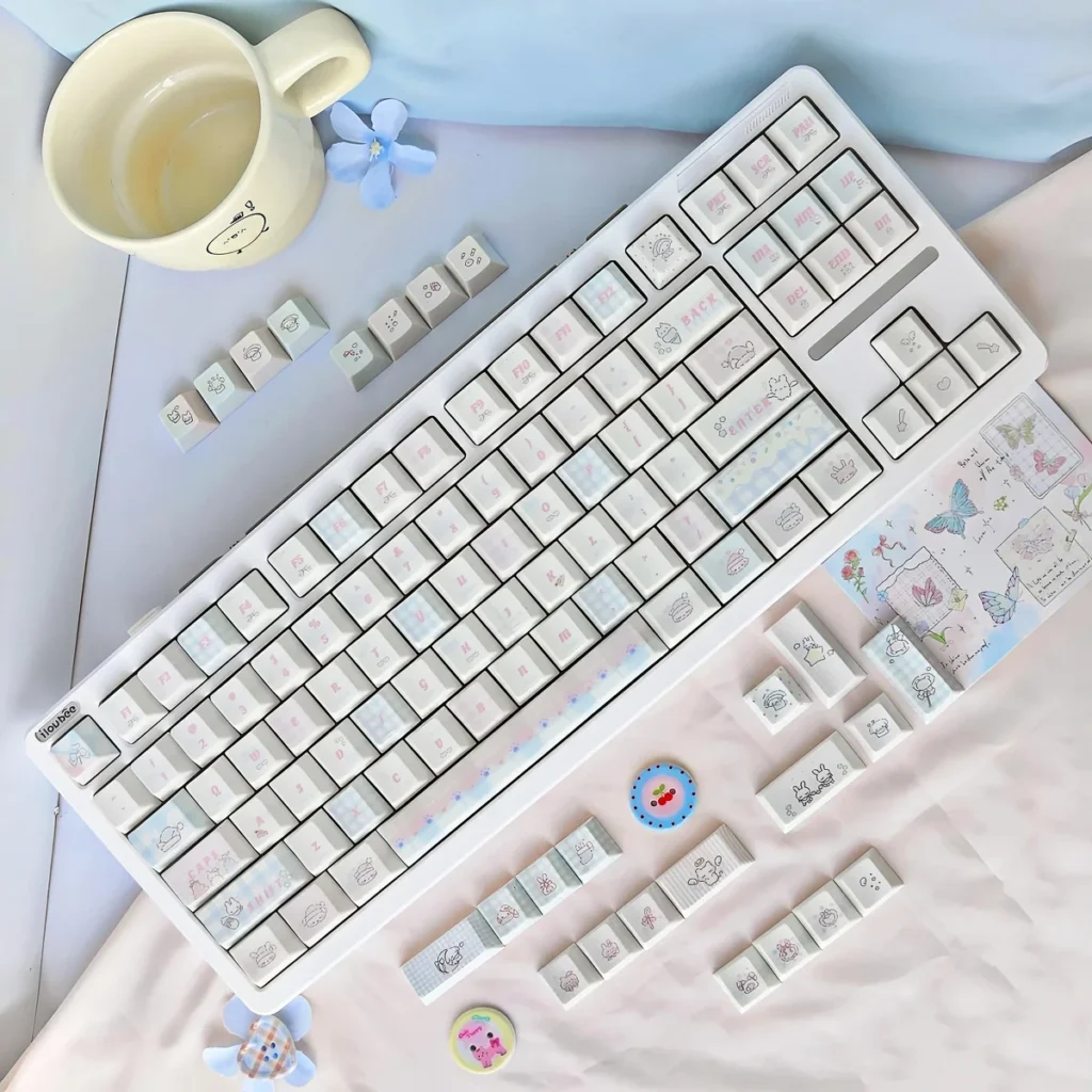 Sweet Marshmallow PBT Dye-Sub Keycaps set with soft pastel hues, showcasing its whimsical design for a cozy aesthetic.