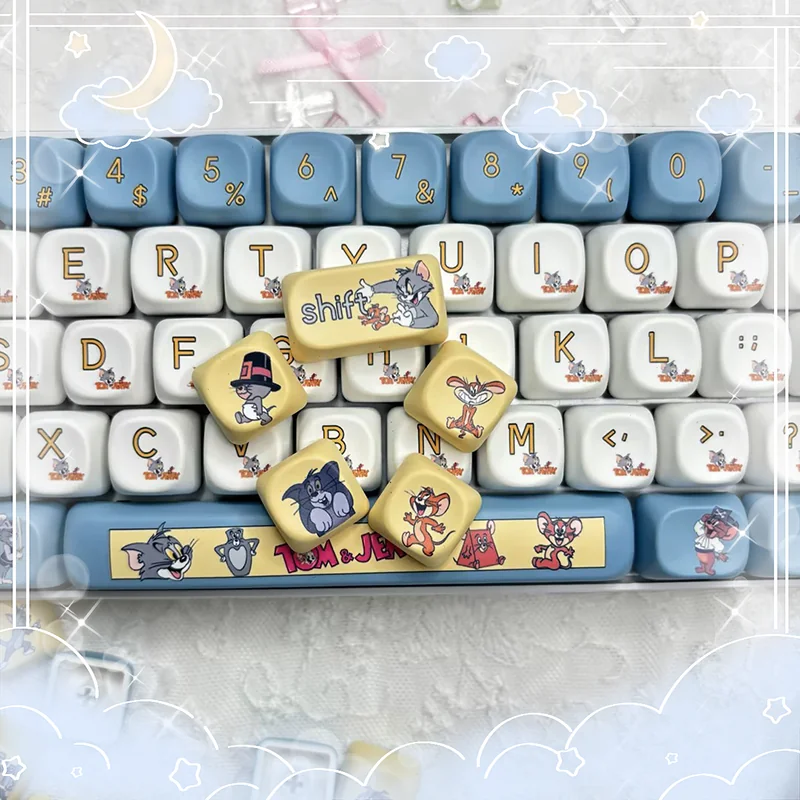Playful close-up of vibrant Tom & Jerry PBT dye-sub keycaps set from the 108-key MOA set, showcasing the uniform MOA profile and iconic cartoon characters design.