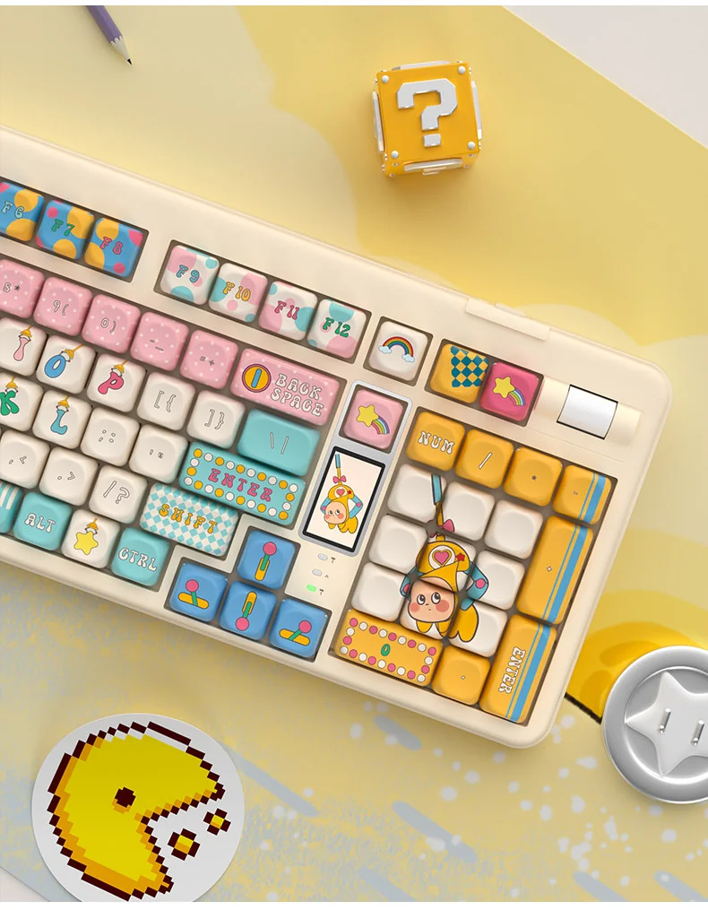 Whimsical claw machine keycap set from a playful side angle, showcasing its intricate miniature arcade design with tiny, colorful prizes.