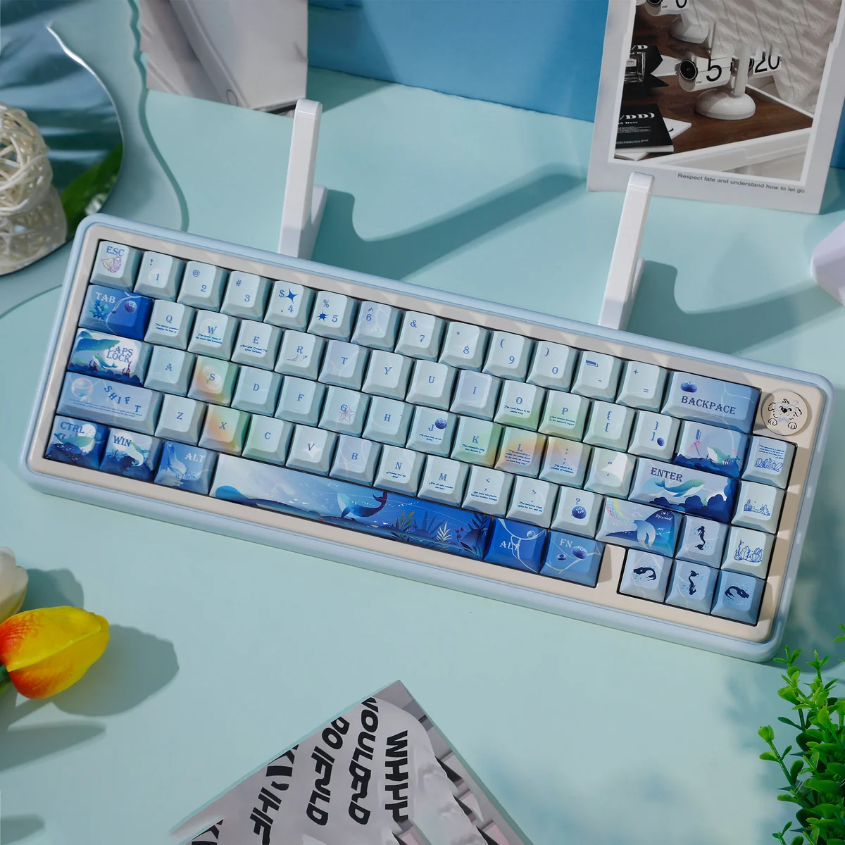 Whale Starlit Keycap Set, seen from an angle. Deep blue keys feature ethereal starlit whales and celestial patterns, a stunning oceanic and cosmic artistic.