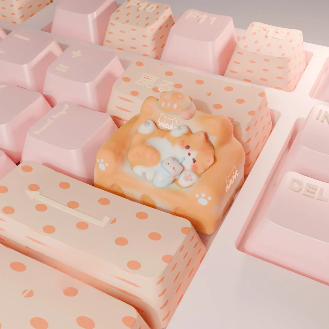 Hand-sculpted artisan cat keycap. Whimsical lounging feline on a cozy, colorful sofa, shown from angles. Charming miniature artistic design.