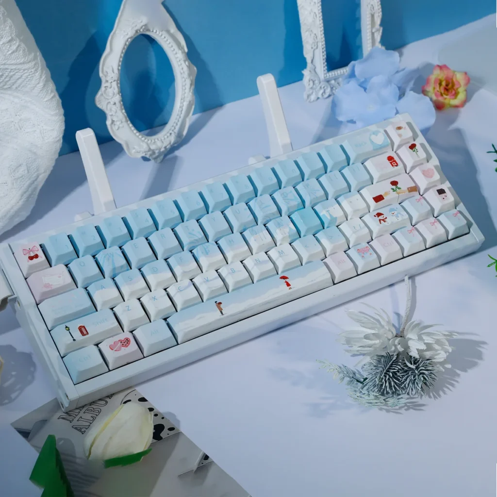 Premium Winter PBT Dye-Sub Keycaps Set, a 120-key set. Soft pastel blue and pink evoke a cozy winter romance aesthetic.
