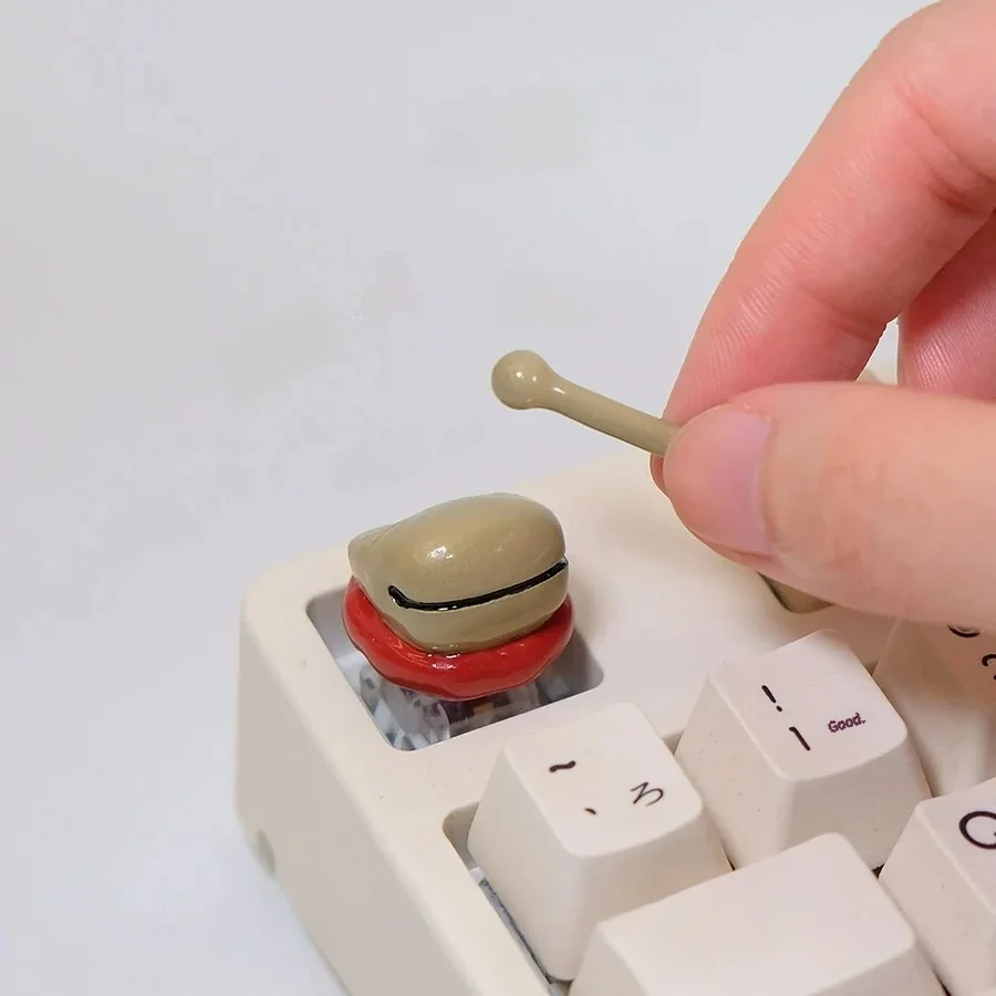 Detailed views of the Handcrafted Wooden Fish Keycaps, revealing its artistic wooden fish design and tranquil aesthetic from various angles.