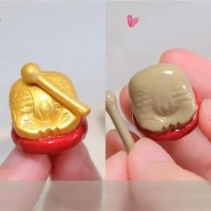 A Handcrafted Wooden Fish Keycaps for mechanical keyboards, showcasing its unique wooden fish design and meditative aesthetic.