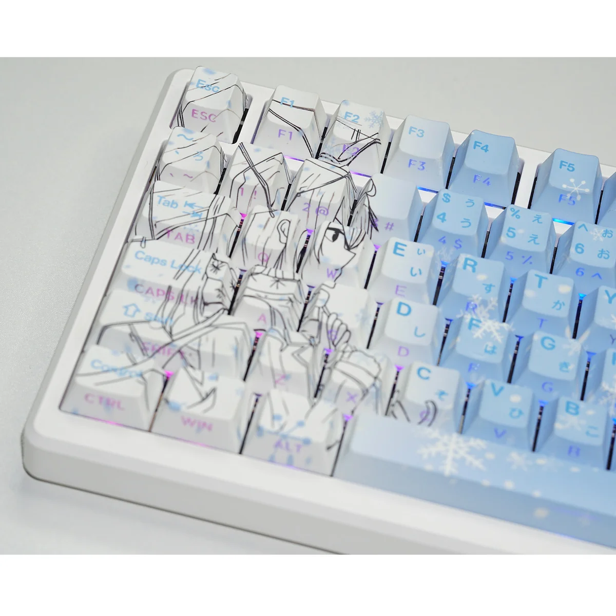 Yukino Keycaps set gallery: gradient blue PBT keys with side-lit legends, shown from multiple angles to reveal the subtle anime-inspired, minimalist design.
