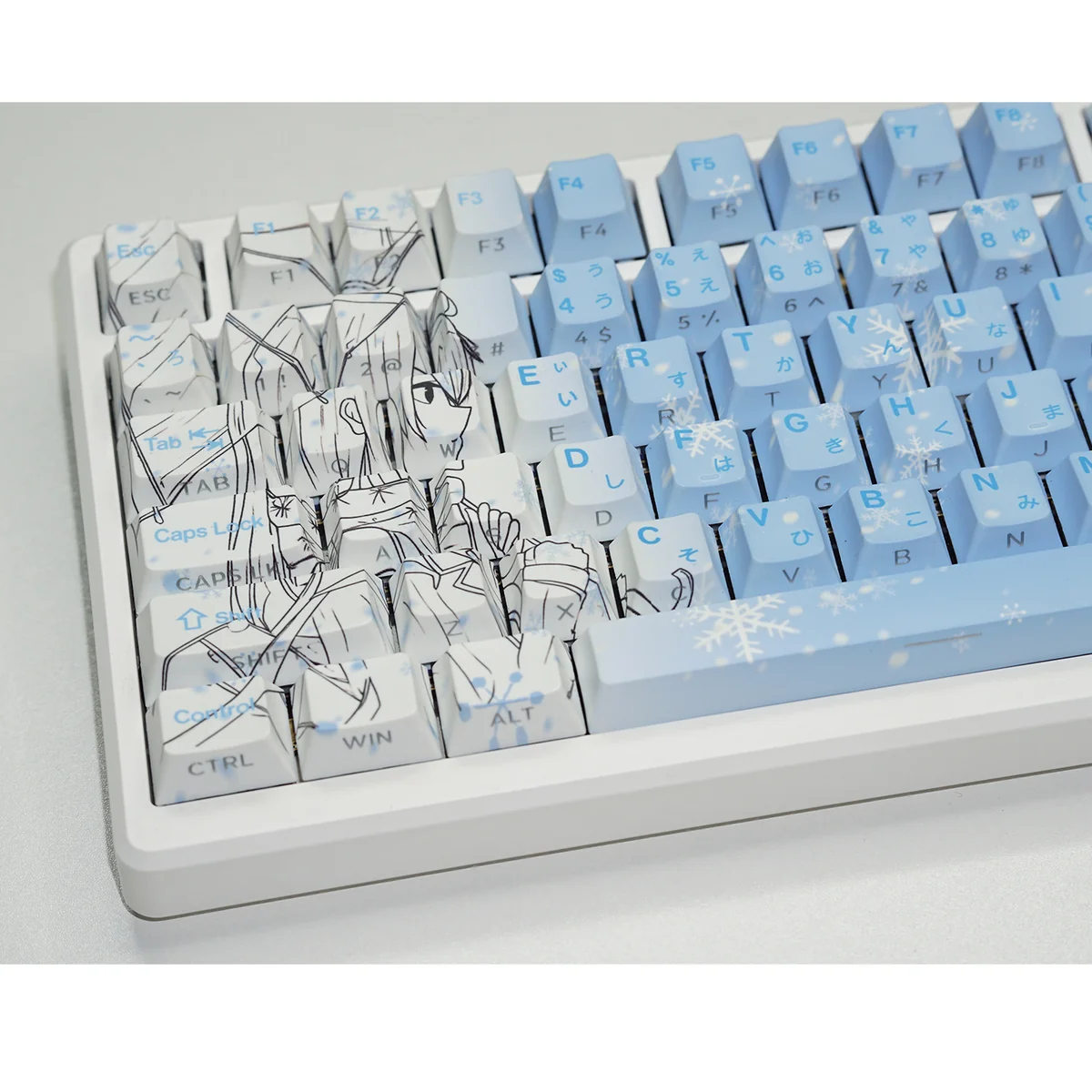 Gallery of Yukino Keycaps Set, showcasing the cool gradient blue side-lit PBT design from multiple angles. Emphasizes minimalist legends and subtle anime design.