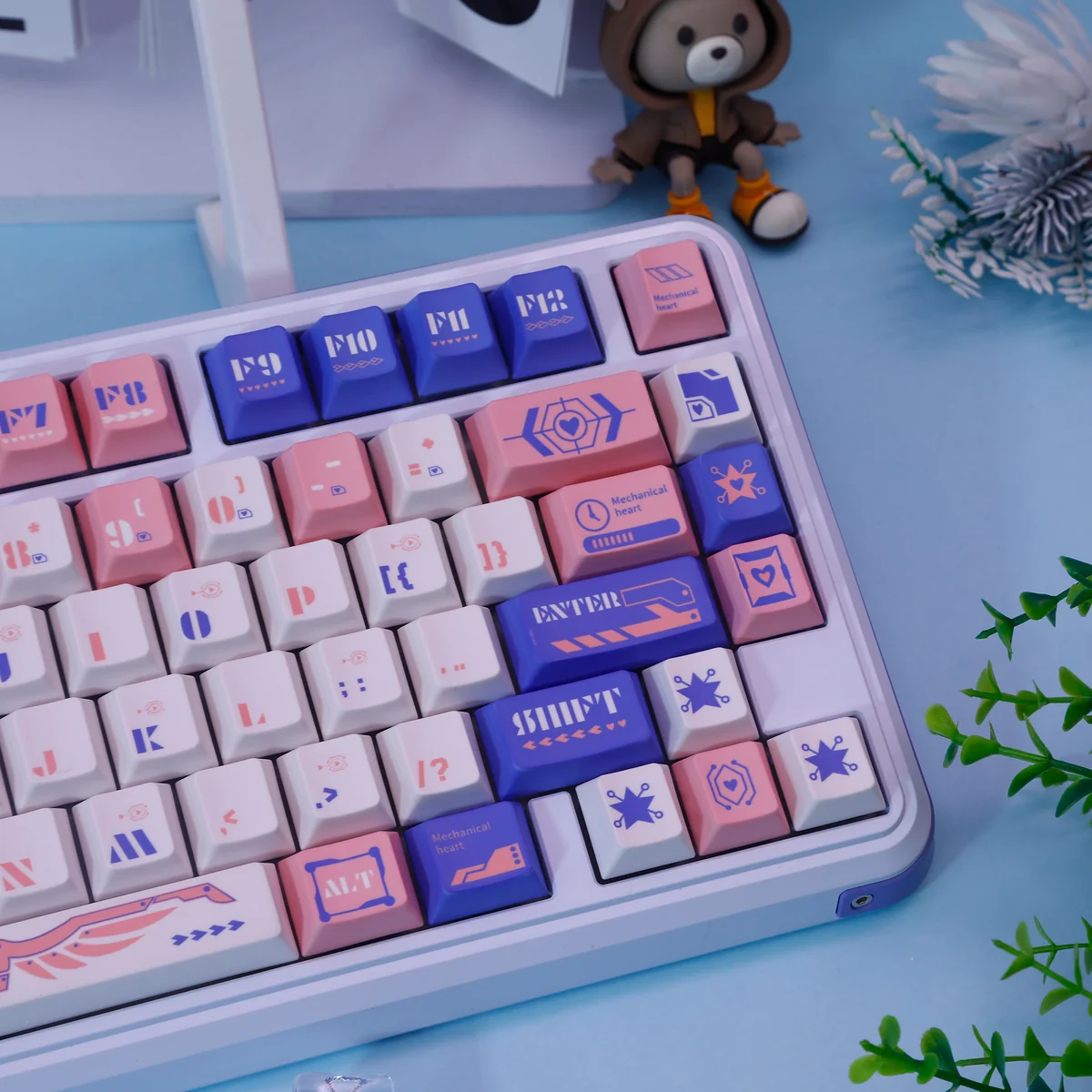 Multiple views of ethereal Mechanical Angel Keycap set, showcasing the dreamy blue and pink dye-sub PBT set with intricate celestial designs, highlighting its premium material.