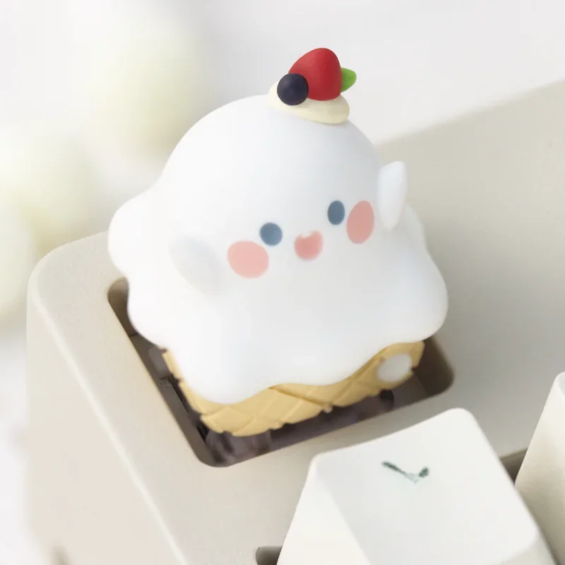 Whimsical ghost ice cream cone artisan keycap, showcasing its spooky-cute design and intricately layered resin craftsmanship from various angles.