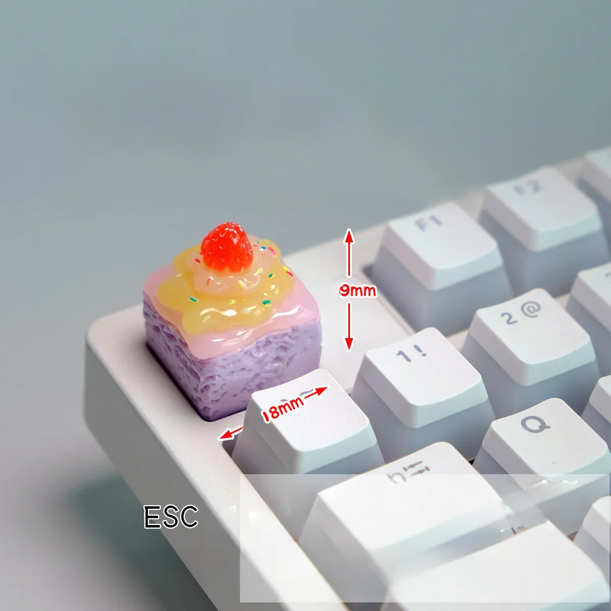 Whimsical handcrafted taro cream artisan keycap, layered with vibrant lavender and white dessert swirls, a delightful keyboard treat.