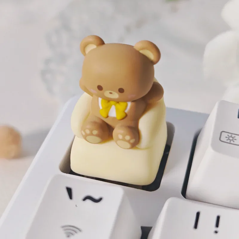 Explore the delightful Whimsical Sofa Bear artisan keycap ESC, showcasing its intricately crafted, layered resin and charming miniature scene from every angles.