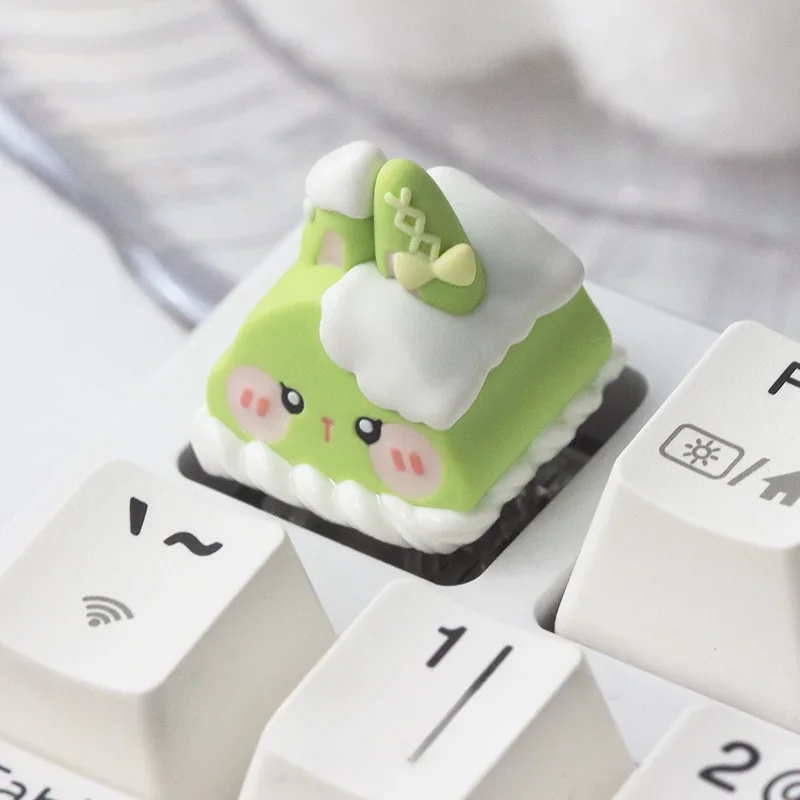 Whimsical handcrafted ESC artisan resin keycap. Adorable food creature with vibrant colors and intricate sculpted details, viewed from multiple angles.